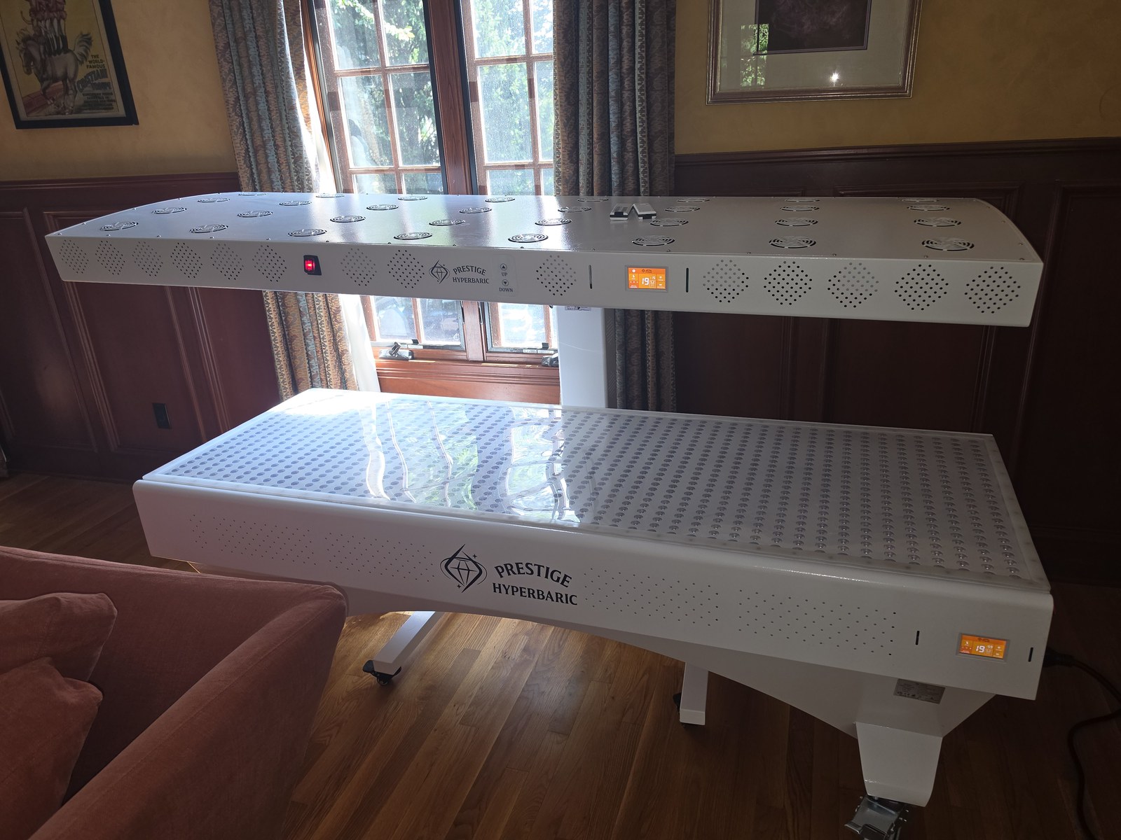 Prestige technician finishing the red light bed setup
