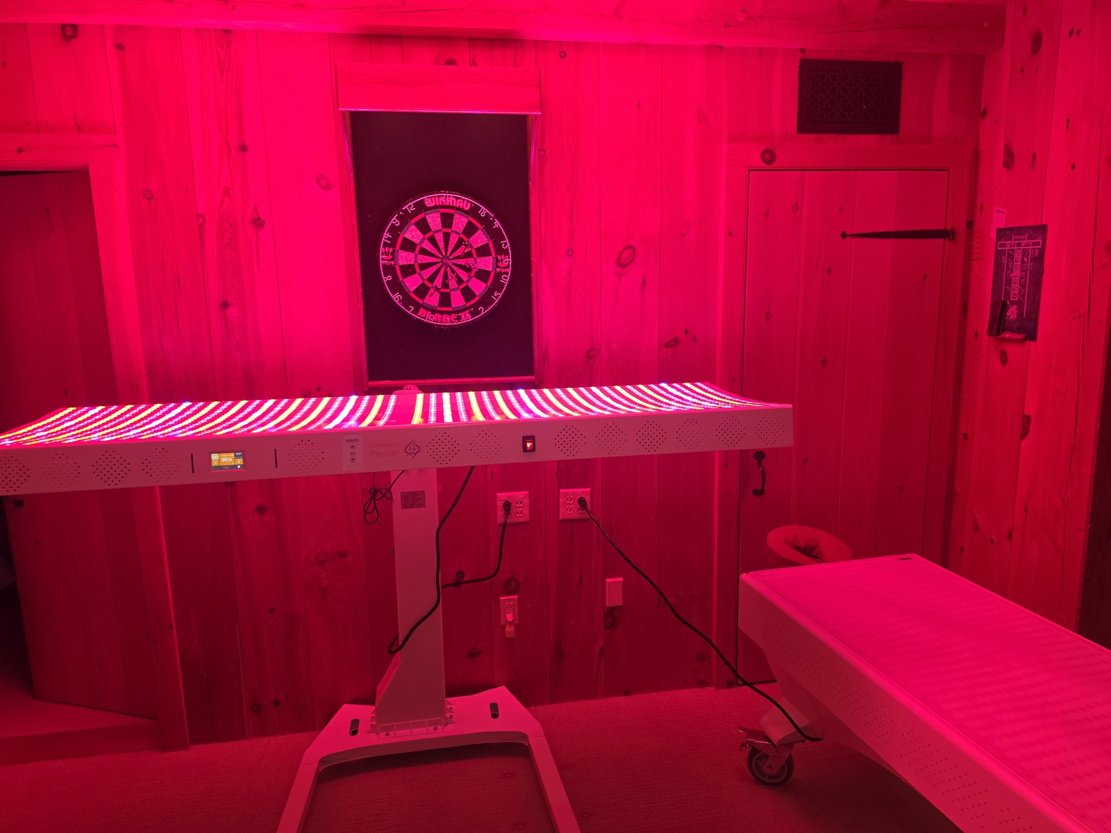 Prestige Pro modular red light therapy bed in a private wellness room