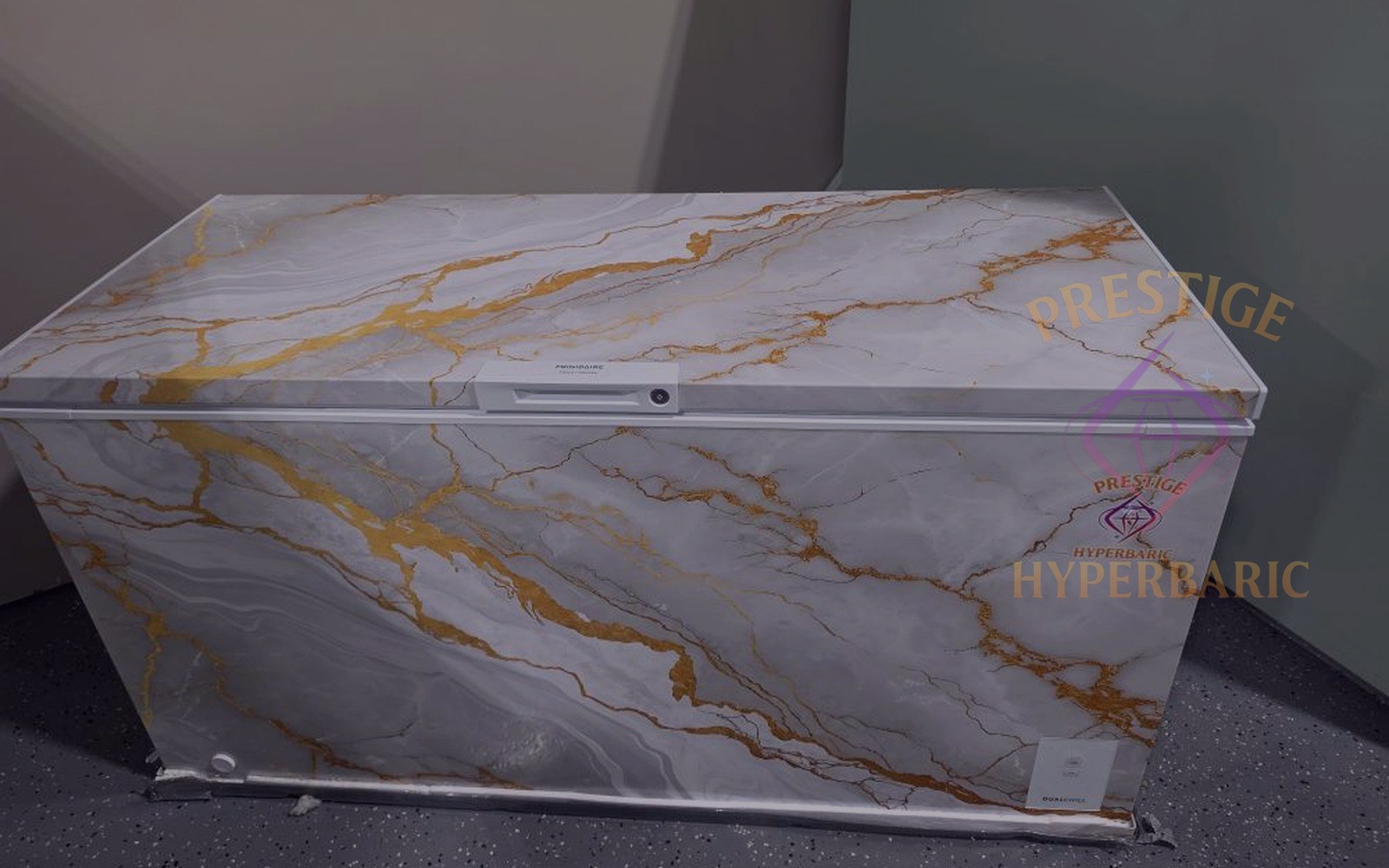 Prestige Cold Plunge with marbled gold and white wrap in the Holiday, FL showroom